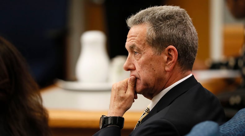 April 26, 2019 - Lawrenceville - District Attorney Danny Porter watches as assistant district attorney Lisa Jones presents autopsy photos to the jury.  The prosecution continued it's case in the third day of the Tiffany Moss murder trial.  Moss, who is representing herself, is accused of intentionally starving her 10-year-old stepdaughter Emani to death in the fall of 2013.   Bob Andres / bandres@ajc.com