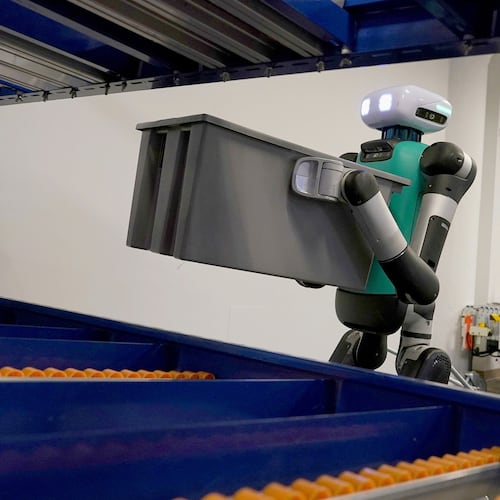 FILE - Agility Robotics' warehouse robot Digit performs maneuvers at the company's office in Pittsburgh on Aug. 16, 2023. (AP Photo/Matt Freed, File)