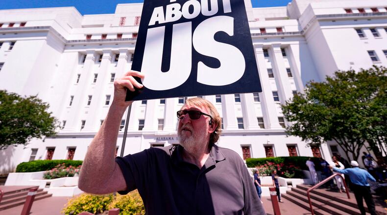 Randall Williams protests outside the Alabama state house during a special session of the Alabama Legislature, Monday, May 4, 2026, in Montgomery, Fla. (AP Photo/Mike Stewart)
