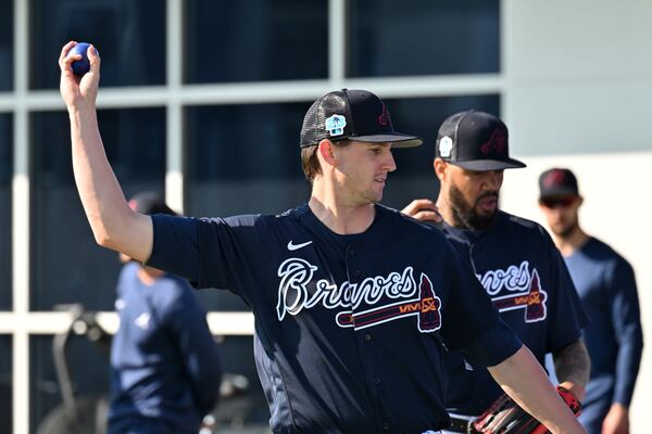 Atlanta Braves starting pitcher Kyle Wright warms up during Braves spring training at CoolToday Park, Saturday, Feb. 18, 2023, in North Port, Fla.. (Hyosub Shin / Hyosub.Shin@ajc.com)