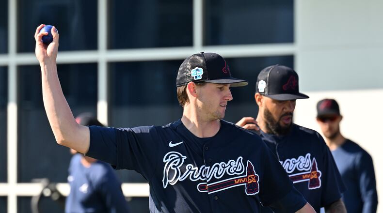Braves starting pitcher Kyle Wright warms up during Braves spring training at CoolToday Park, Saturday, Feb. 18, 2023, in North Port, Fla.. (Hyosub Shin / Hyosub.Shin@ajc.com)