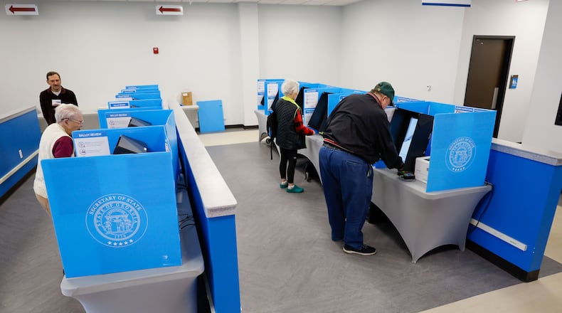 People cast their votes at the Gwinnett County Voter and Registration during the first day of early voting in the Georgia presidential primary to determine the Democratic and Republican nominees on Monday, Feb. 19, 2024. (Miguel Martinez / miguel.martinezjimenez@ajc.com)