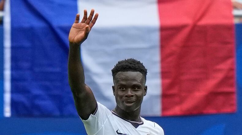 England's Bukayo Saka (7) celebrates scoring their fourth goal during the World Cup third-place playoff soccer match between France and England in Miami Gardens, Fla., Saturday, July 18, 2026. (AP Photo/Lynne Sladky)