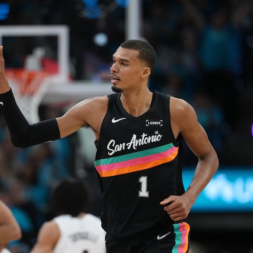San Antonio Spurs forward Victor Wembanyama (1) celebrates a play against the Portland Trail Blazers during the first half in Game 1 of a first-round NBA playoffs basketball series in San Antonio, Sunday, April 19, 2026. (AP Photo/Eric Gay)