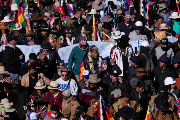 Supporters of former President Evo Morales march towards the offices of the Electoral Tribunal in El Alto, Bolivia, Friday, May 16, 2025. (AP Photo/Juan Karita)
