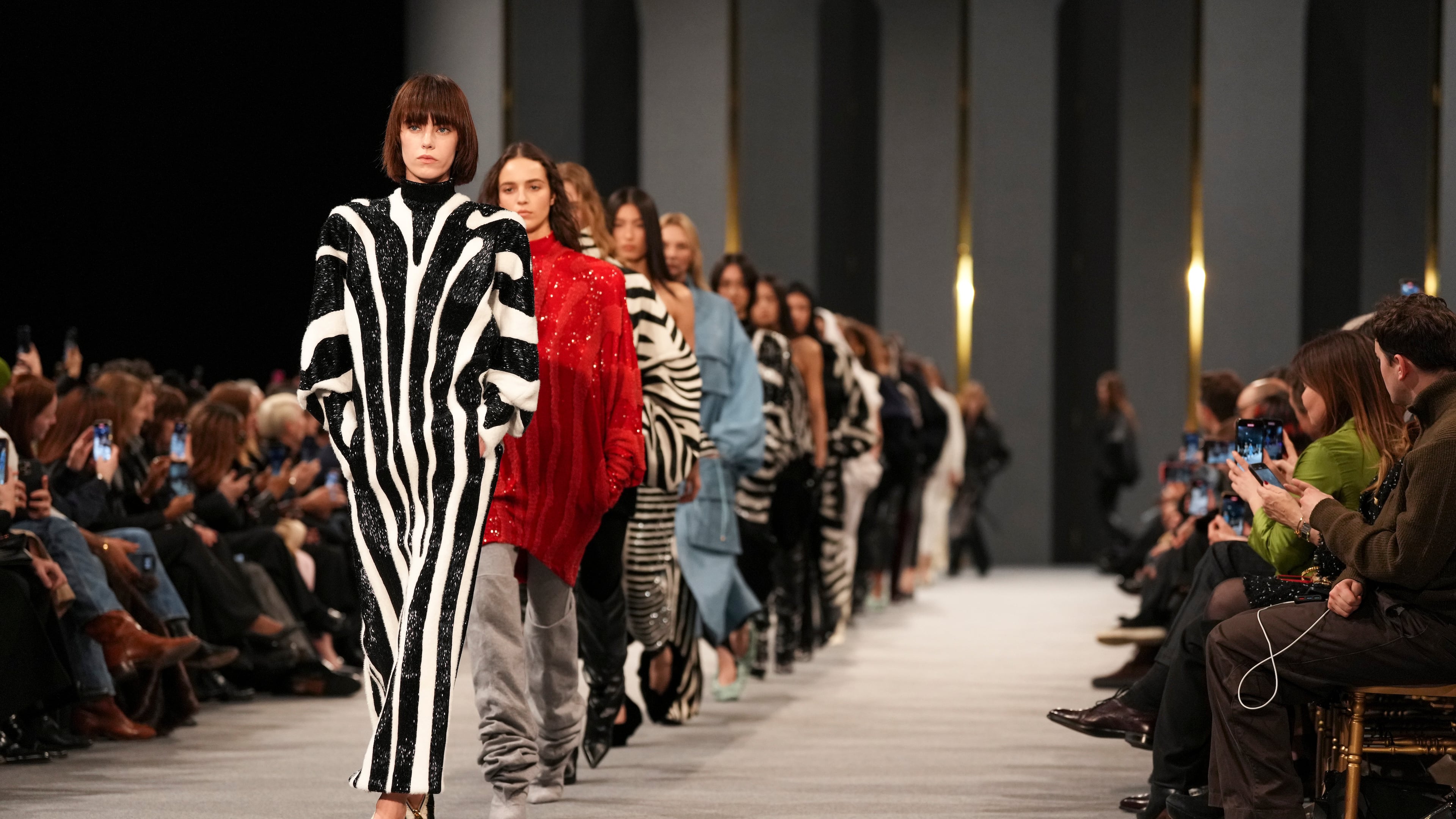 FILE - Models wear creations as part of the Balmain Fall/Winter 2025-2026 Womenswear collection presented in Paris, March 5, 2025. (Photo by Scott A Garfitt/Invision/AP, File)