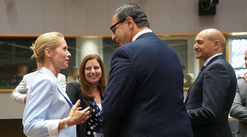 European Union foreign policy chief Kaja Kallas, left, speaks with Cypriot Foreign Minister Constantinos Kombos, center, during a round table meeting of EU foreign ministers in Brussels, Monday, July 13, 2026. (AP Photo/Marius Burgelman)