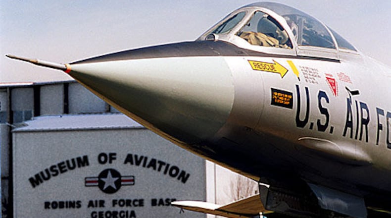 Three men were killed Friday evening when a vehicle drove through a gate at Robins Air Force Base and collided with a security barrier, authorities said.