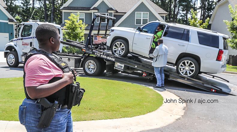 The Cobb County Sheriff’s Office was executing a search warrant at a home on Zachary Court when a man said he had explosives in his SUV. The Cobb police bomb squad was called to the scene.