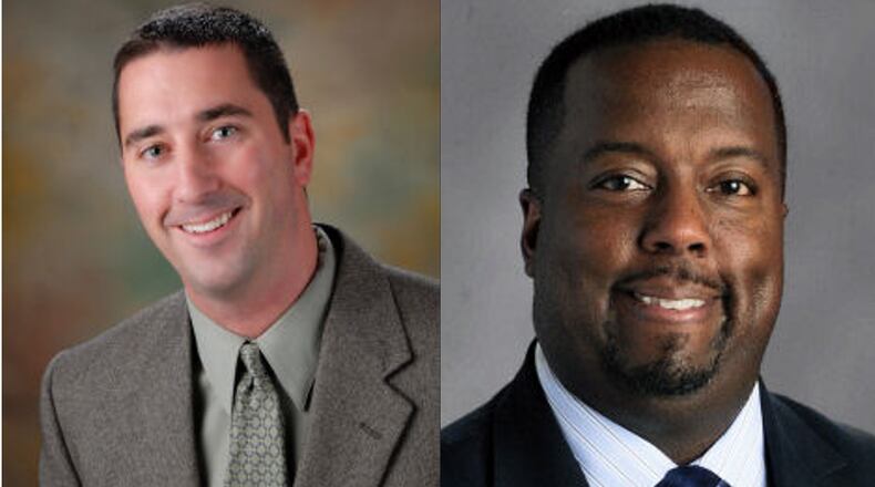Eric Davidson left, and Christopher Martin have been promoted to principal positions at two Gwinnett County high schools.
