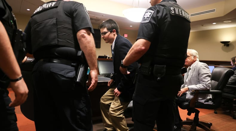Colt Gray, the 16-year-old Apalachee High School shooter, stands to be handcuffed following his sentencing at Barrow County Superior Court in Winder on July 28, 2026. He received life without parole. (Arvin Temkar/AJC)