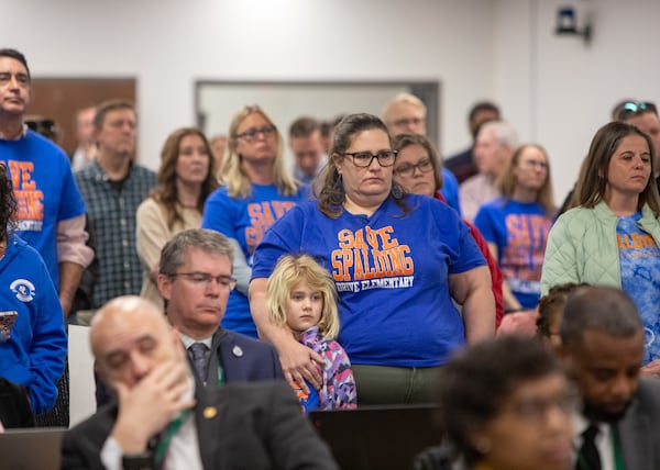 Parents from both schools packed school board meetings and pleaded with officials in Februrary to keep the schools open. (Jenni Girtman for the AJC)
