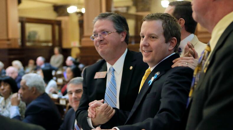 2/1/18 - Atlanta - Rep. Bert Reeves, R - Marietta, is congratulated after the passage of HB159, concerning adoption, in the House. BOB ANDRES /BANDRES@AJC.COM