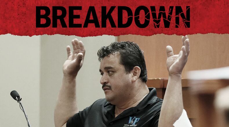 Pedro Castillo Flores shows how Anthony Hill had his hands raised before the shooting during the murder trial of former DeKalb County Police Officer Robert "Chip" Olsen. (Bob Andres / robert.andres@ajc.com)