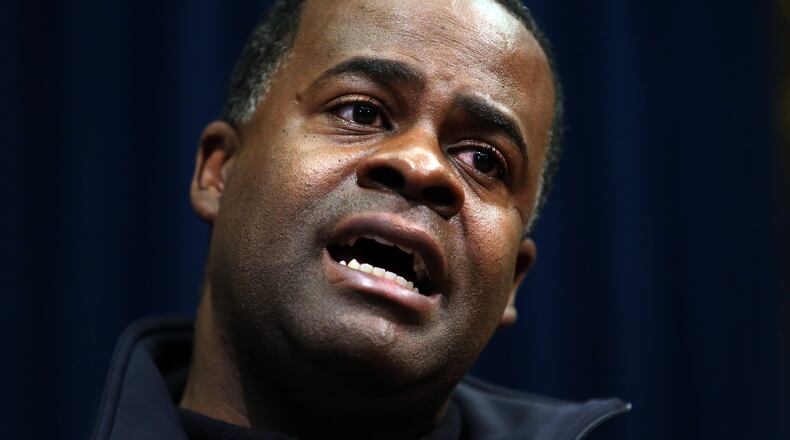 Atlanta Mayor Kasim Reed responds to a pointed question about the city's response to the snow storm during a press conference Wednesday, January 29, 2014 in the Governor's office at the State Capitol.