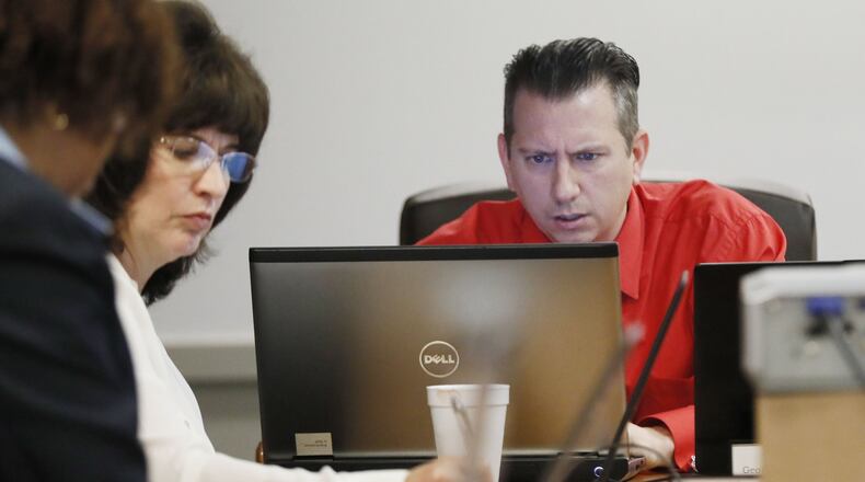 Craig Knowles, board chairman, at the Georgia Board of Massage Therapy, said a proposed change in state law would give the board more clout when it comes to policing the profession. Bob Andres / bandres@ajc.com