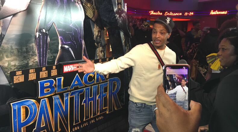 Atlanta rapper T.I. helped buy tickets for the community so folks could see a pre-release screening of Marvel's "Black Panther" movie on Tuesday, Feb. 13, 2018.