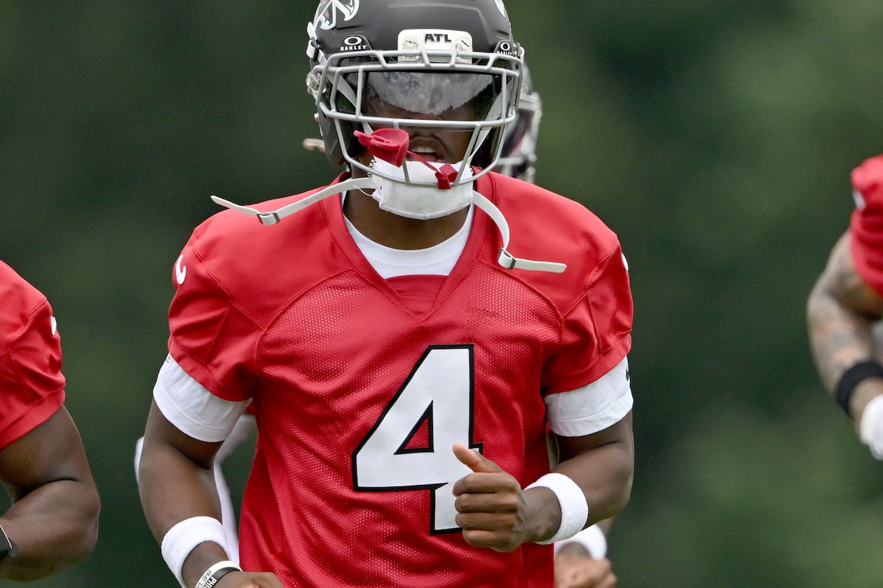 Atlanta Falcons wide receiver Jahan Dotson warms up during an OTA workout at the Atlanta Falcons Training Facility in May. (Hyosub Shin/AJC)