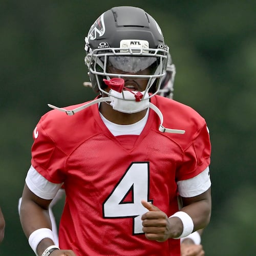 Atlanta Falcons wide receiver Jahan Dotson warms up during an OTA workout at the Atlanta Falcons Training Facility in May. (Hyosub Shin/AJC)