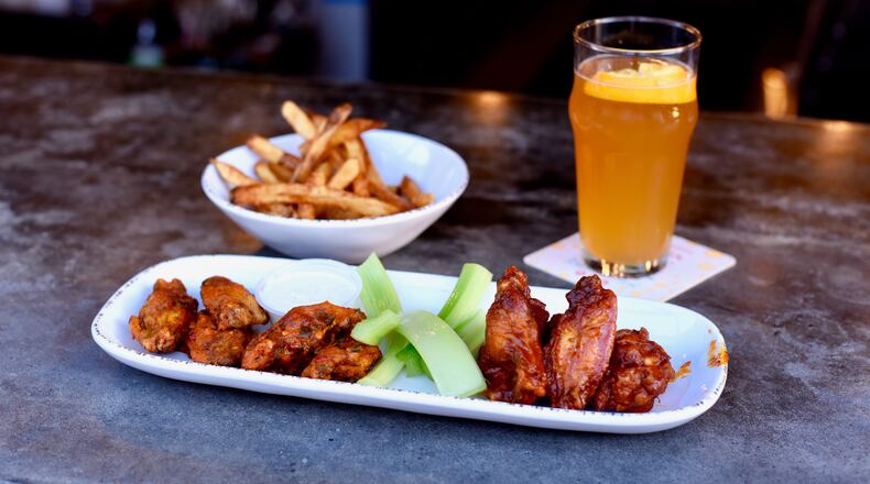 BoneYard Kitchen & Tap offers 20-some sauces for its wings, ranging from mild to ultra-hot.
