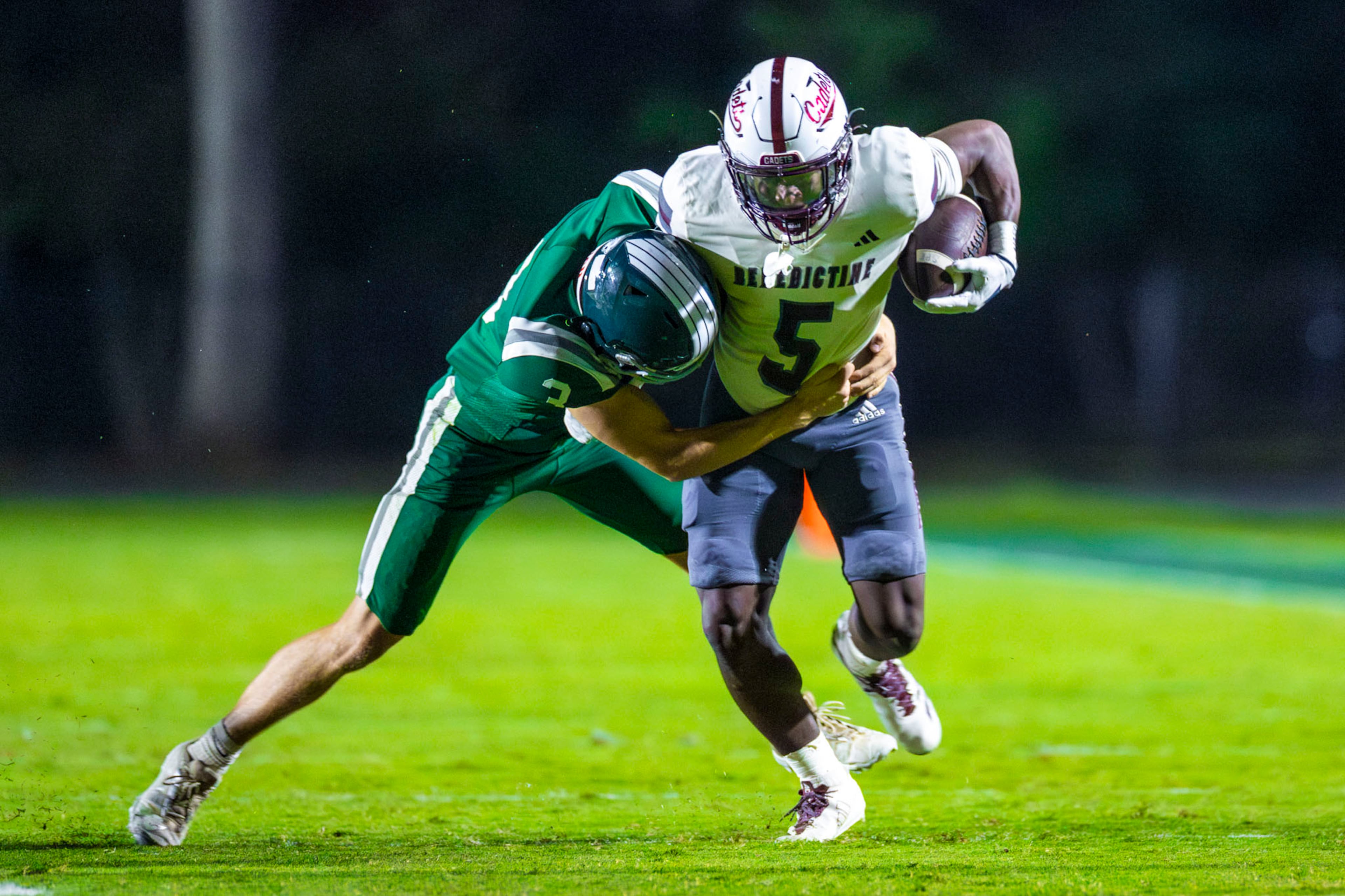 Benedictine running back Stanley Smart Jr. (5) gets tackled during a run against Westminster at Fritz Orr Field in Atlanta, GA on Friday, Sept. 19th, 2025. (Oscar Guevara Saenz for the AJC)