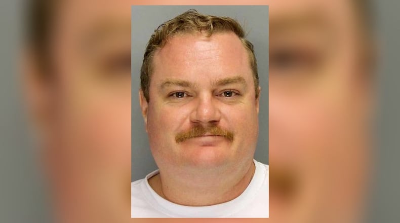 Bud Raymond, 38, was charged with one count of aggravated assault. He was released from the Cobb County jail after posting $15,000 bond, records show.