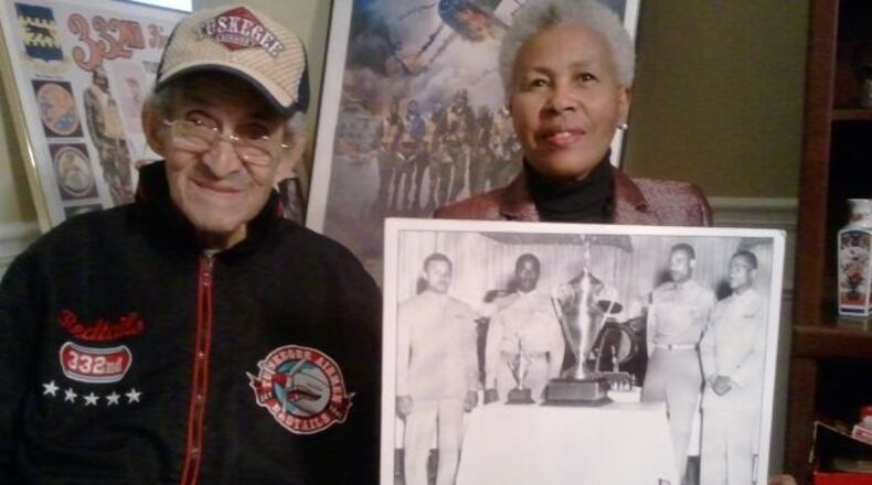 Zellie Orr with Tuskegee Airman Norris Connally and his artifacts. Photo credit: Geraldine Gilliam.