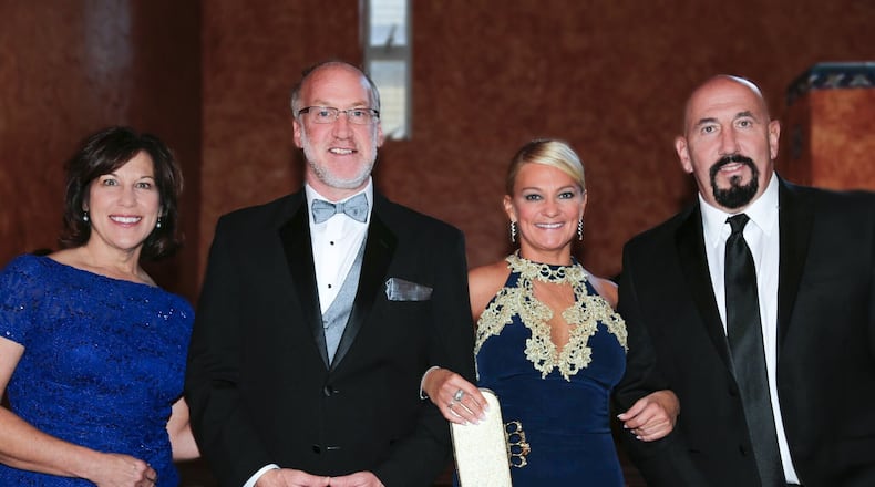 Jeanne and Jeff Schultz, Stacey Weiss and Chris Dimino at the Take off the Mask of Addiction Masquerade Ball. CONTRIBUTED BY LUCY DORRIS PHOTOGRAPHY
