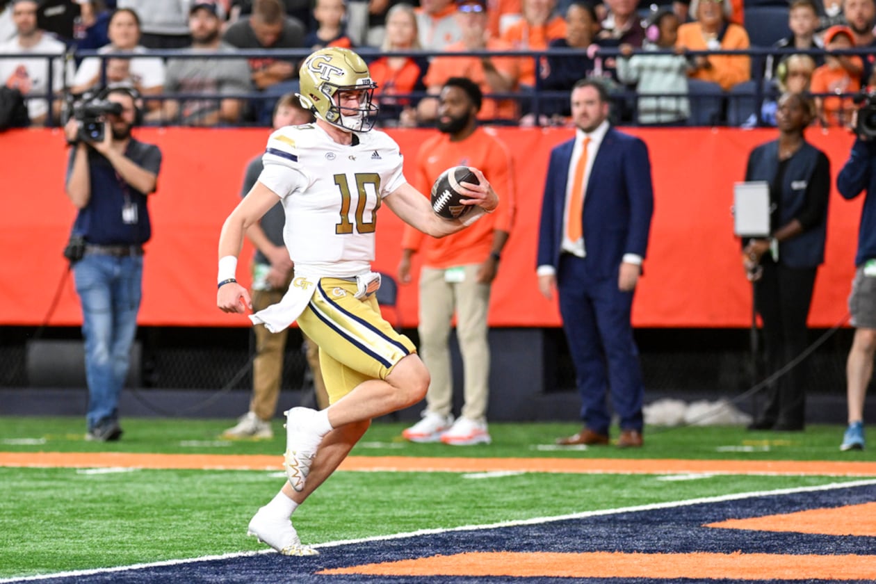 Georgia Tech quarterback Haynes King (10) runs for a touchdown against Syracuse during the first half of an NCAA football game on Saturday, Sept. 7, 2024, in Syracuse, N.Y. (Hans Pennink/AP)