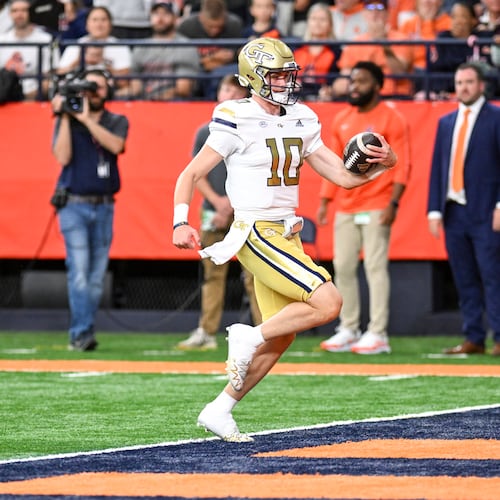 Georgia Tech quarterback Haynes King (10) runs for a touchdown against Syracuse during the first half of an NCAA football game on Saturday, Sept. 7, 2024, in Syracuse, N.Y. (Hans Pennink/AP)