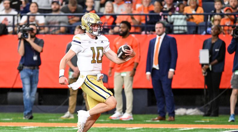 Georgia Tech quarterback Haynes King (10) runs for a touchdown against Syracuse during the first half of an NCAA football game on Saturday, Sept. 7, 2024, in Syracuse, N.Y. (Hans Pennink/AP)