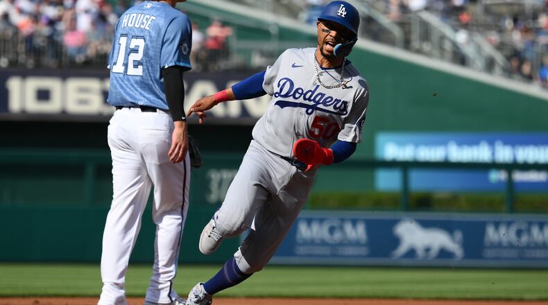 FILE - Los Angeles Dodgers' Mookie Betts in action during a baseball game against the Washington Nationals, April 4, 2026, in Washington. (AP Photo/Nick Wass, File)