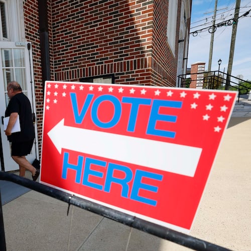People enter Canton City Hall, where voters on Tuesday, Aug. 26, 2025, were participating in the special election for the state senate seat vacated by U.S. Treasurer Brandon Beach. (Miguel Martinez/AJC)