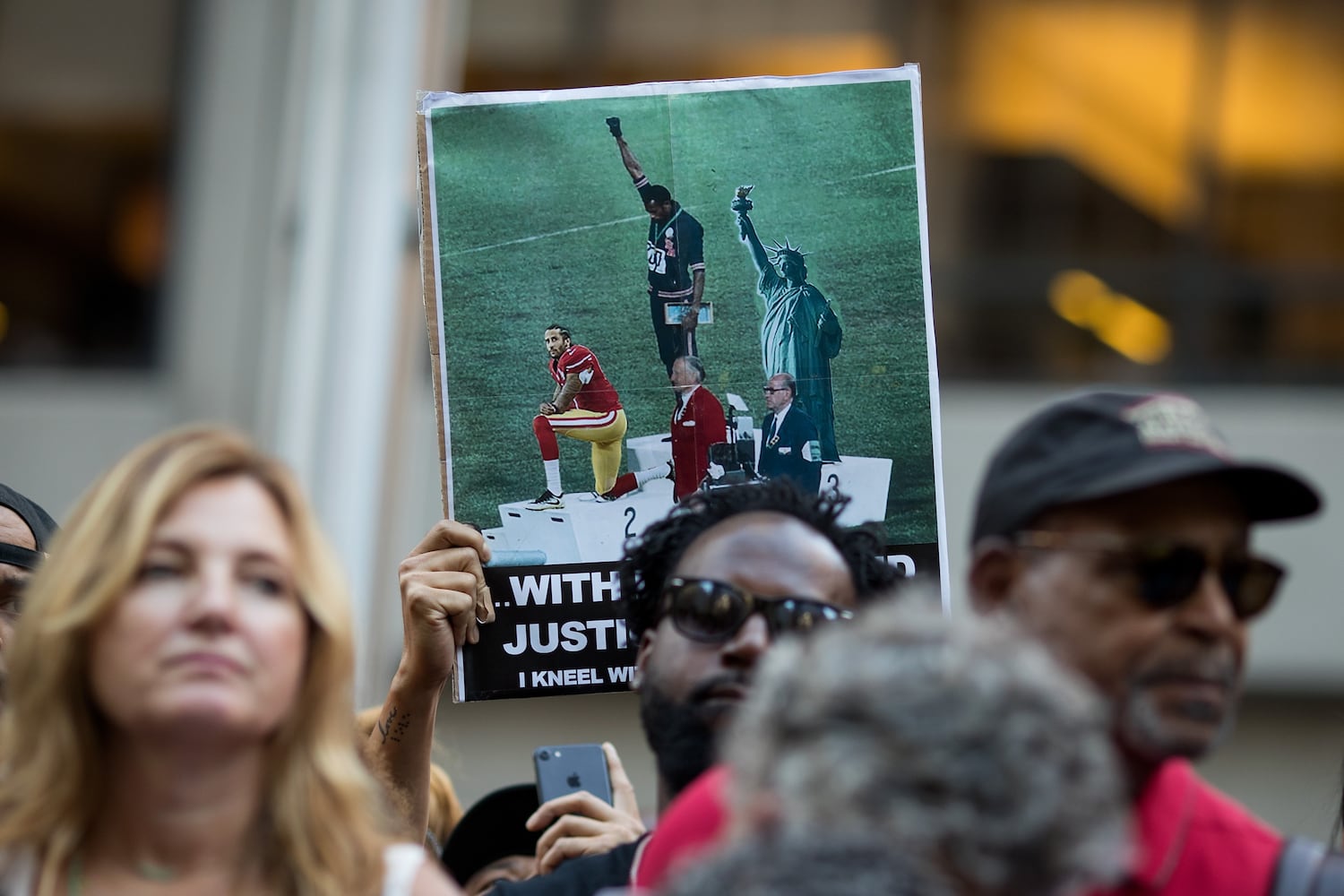Photos: Colin Kaepernick supporters rally at NFL offices