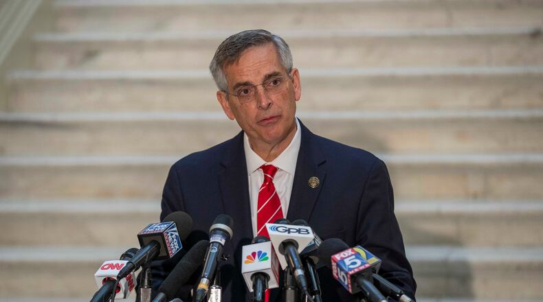 Georgia Secretary of State Brad Raffensperger makes remarks during a press conference at the Georgia State Capitol building in Atlanta, Wednesday, Dec. 2, 2020. (Alyssa Pointer/Atlanta Journal-Constitution/TNS)