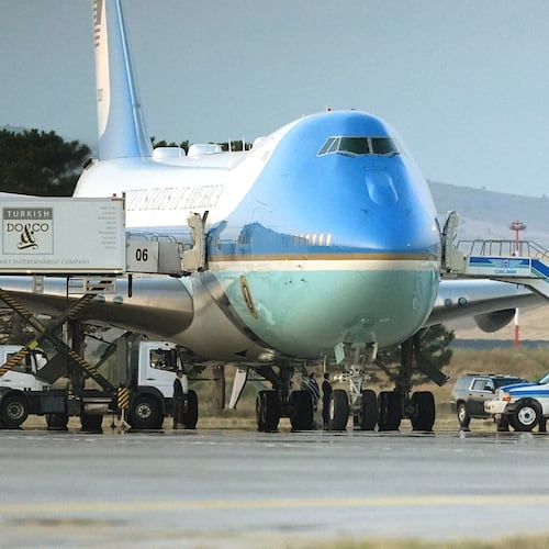 Catering trucks are parked at Air Force One on the tarmac as the motorcade carrying U.S. President Donald Trump arrives on the tarmac to depart following the NATO summit at Ankara International Airport in Ankara, Turkey, Wednesday, July 8, 2026. (AP Photo/Alex Brandon)