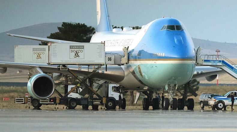 Catering trucks are parked at Air Force One on the tarmac as the motorcade carrying U.S. President Donald Trump arrives on the tarmac to depart following the NATO summit at Ankara International Airport in Ankara, Turkey, Wednesday, July 8, 2026. (AP Photo/Alex Brandon)