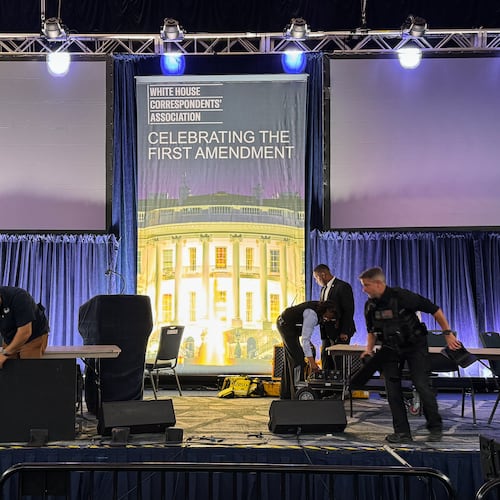 Staff clean up after a shooting incident at the White House Correspondents Dinner, Saturday, April 25, 2026, in Washington. (AP Photo/Mark Schiefelbein)