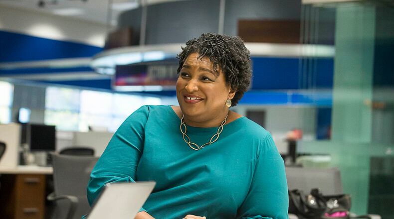 A day after bowing out of the race for governor, former Democratic candidate for governor Stacey Abrams speaks to Atlanta Journal Constitution reporters at the WSB-TV headquarters in Atlanta. (ALYSSA POINTER/ALYSSA.POINTER@AJC.COM)