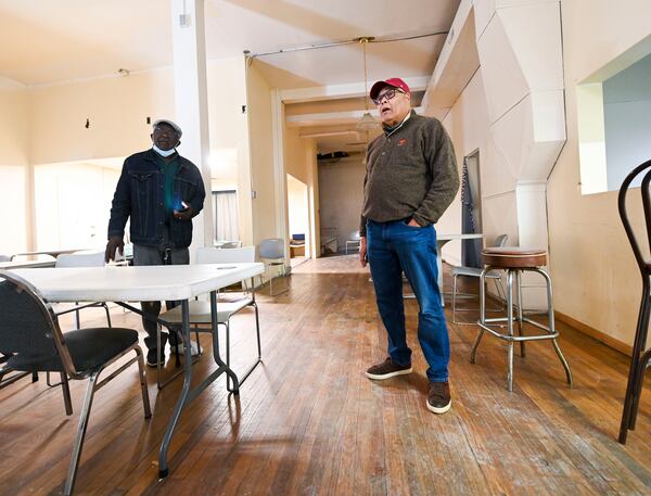 Edward Driver (left) and Edward Bowen stand inside the Prince Hall Masonic Lodge on Auburn Avenue on Nov. 8, 2021. Daniel Varnado/for the AJC 2021