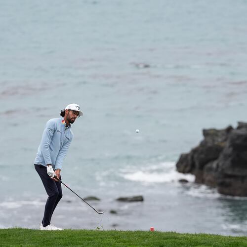 Akshay Bhatia putts to the eighth green at Pebble Beach Golf Links during the third round of the AT&T Pebble Beach Pro-Am golf tournament, Saturday, Feb. 14, 2026, in Pebble Beach, Calif. (AP Photo/Godofredo A. Vásquez)