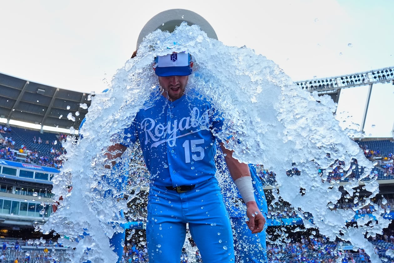 The Royals' Lane Thomas is doused by teammates after beating the Padres on Saturday, July 18, 2026, in Kansas City, Mo. The Braves acquired Thomas and Bailey Falter on Saturday. (Charlie Riedel/AP)