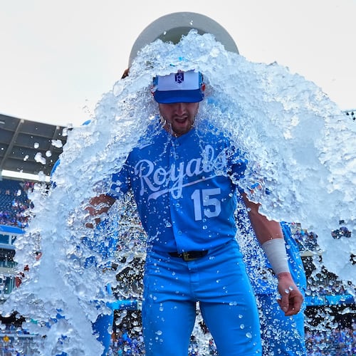 The Royals' Lane Thomas is doused by teammates after beating the Padres on Saturday, July 18, 2026, in Kansas City, Mo. The Braves acquired Thomas and Bailey Falter on Saturday. (Charlie Riedel/AP)