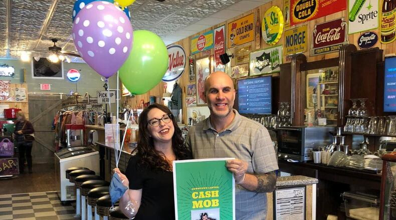 Nick and Stefanie Forte, owners of A Cone to Pick, were the first business in the Canton Cash Mob. CONTRIBUTED