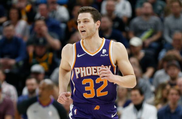 FILE - Phoenix Suns guard Jimmer Fredette (32) runs up court during the first half of an NBA basketball game against the Utah Jazz Monday, March 25, 2019, in Salt Lake City. (AP Photo/Rick Bowmer, FIle)