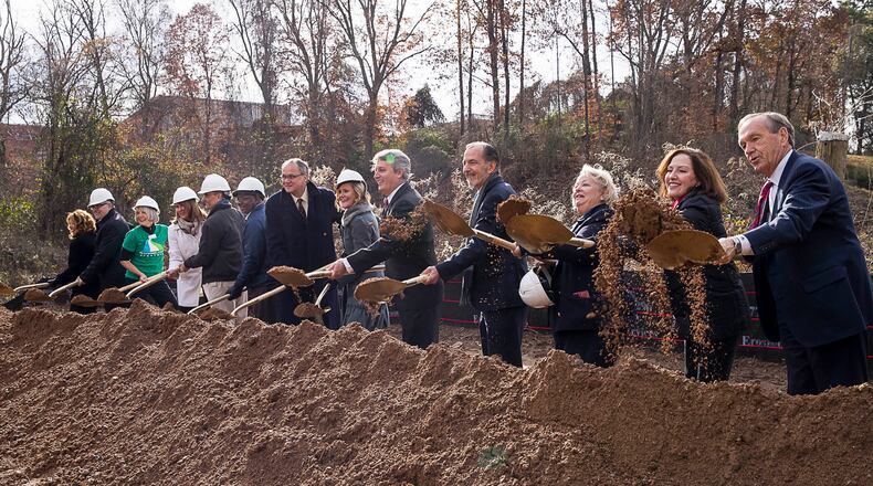 Community members and members of the local, state and national government participate in a groundbreaking ceremony at the site of the Peachtree Creek Greenway in Brookhaven on Wednesday, December 12, 2018. (ALYSSA POINTER/ALYSSA.POINTER@AJC.COM)