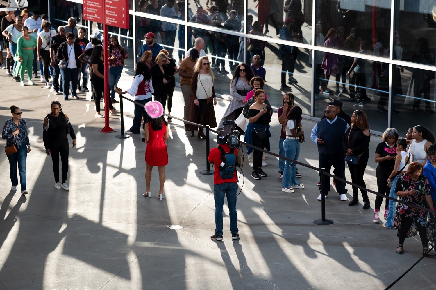 Fans head to the Taylor Swift and Janet Jackson concerts in downtown Atlanta on Friday, April 28, 2023.   (Ben Gray / Ben@BenGray.com)