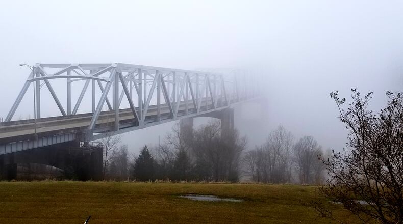 "I took this on the east side of the great river separating Mississippi and Louisiana," wrote Karla Sneegas of Tucker. "Moments after I shot this the bridge was invisible."