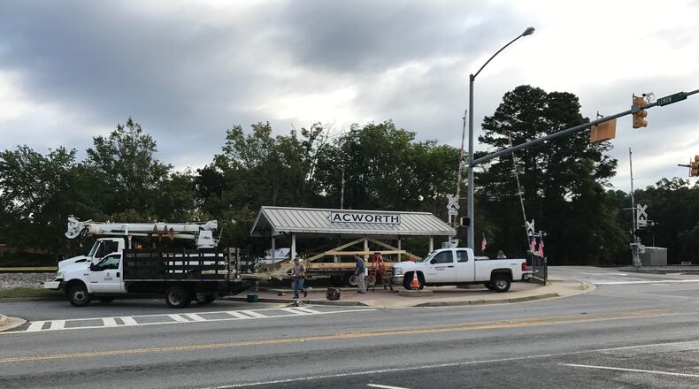Acworth employees prepare to move the Open Air Acworth Depot Pavilion to the corner of Cowan and Cowan Connector. Courtesy of Acworth