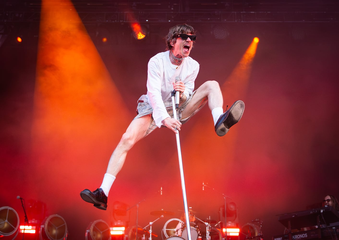 Cage the Elephant brings its action-packed show to the Peachtree stage, full of pyro, leaps and guitarist Brad Schulz joining the crowd while playing Saturday, Sept. 20, 2025, at the Shaky Knees Music Festival at Piedmont Park in Atlanta. (Ryan Fleisher for the AJC)